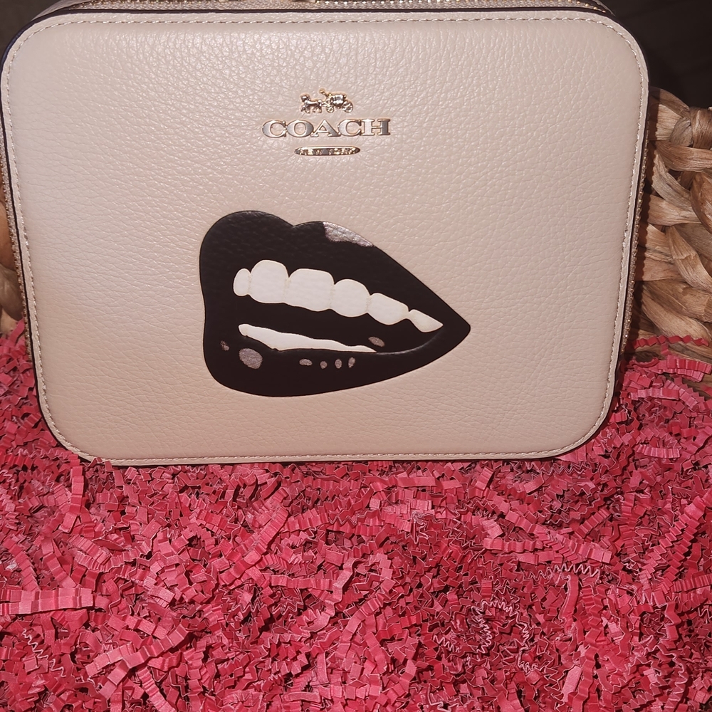 Coach Cream Crossbody Bag with Black Lips Design